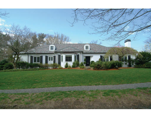 11 Princeton Road Brookline, MA 02467 - Photo 2 of 13 a front view of a house with a garden