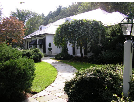 11 Princeton Road Brookline, MA 02467 - Photo 3 of 13 a view of a house with a garden