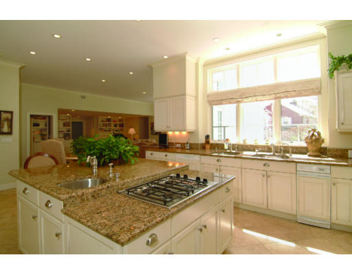 11 Princeton Road Brookline, MA 02467 - Photo 7 of 13 a kitchen with counter top space and stainless steel appliances