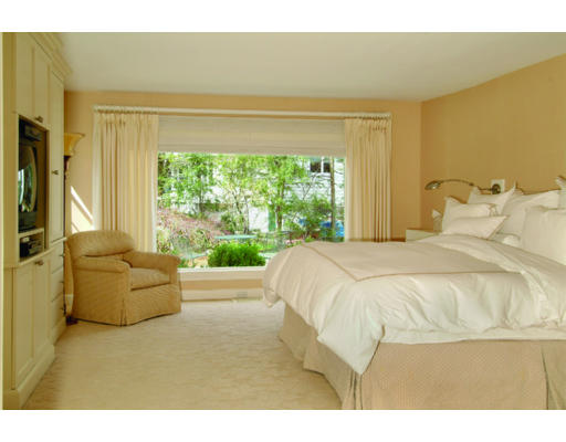 11 Princeton Road Brookline, MA 02467 - Photo 10 of 13 a bedroom with a bed and a large window