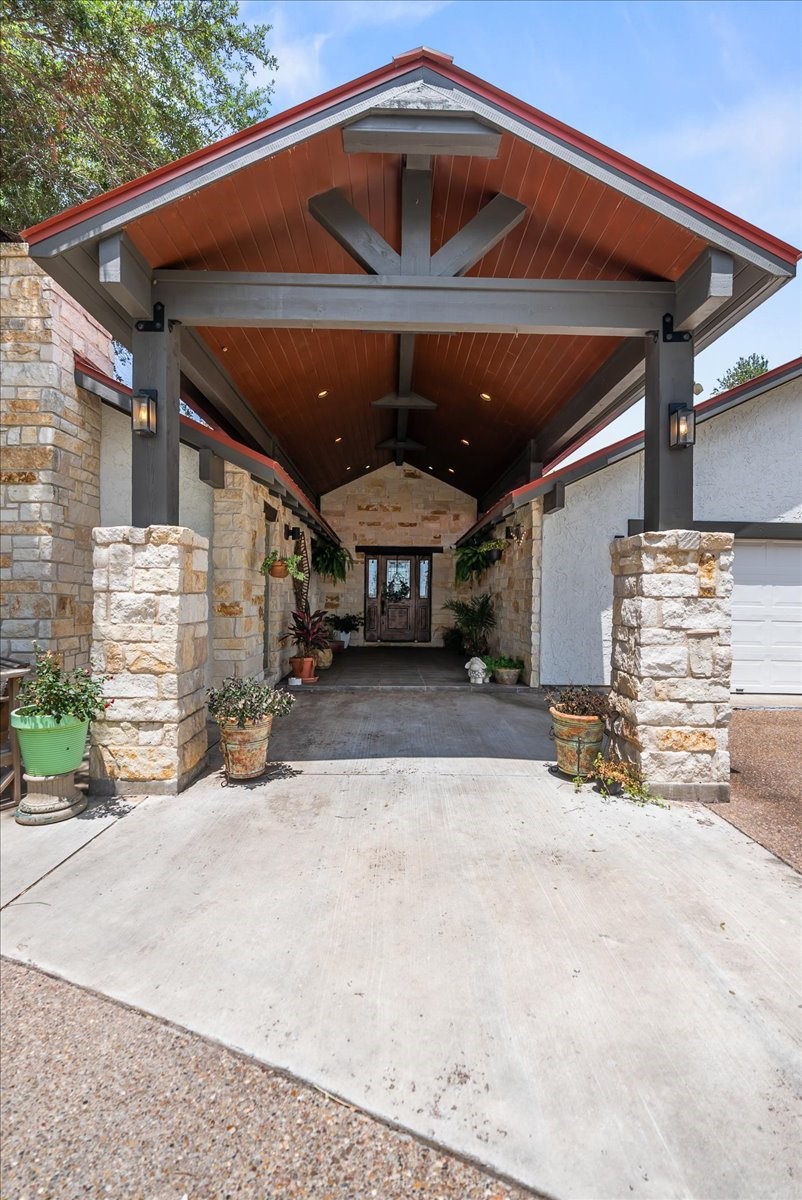 9795 County Road 2249 Sinton, TX 78387 - Photo 2 of 37 a view of a car garage