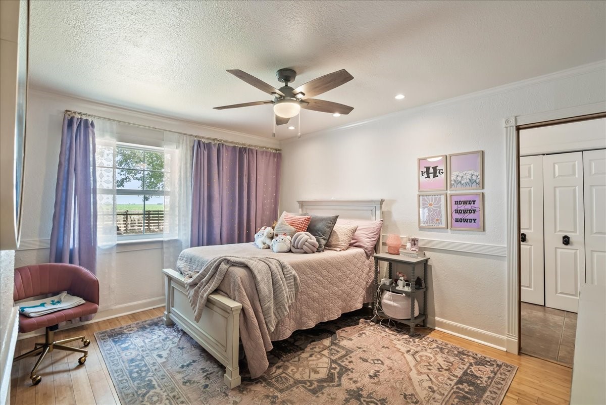 9795 County Road 2249 Sinton, TX 78387 - Photo 21 of 37 a bedroom with a bed and a window