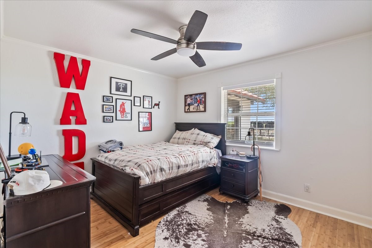 9795 County Road 2249 Sinton, TX 78387 - Photo 25 of 37 a bedroom with a bed and a window