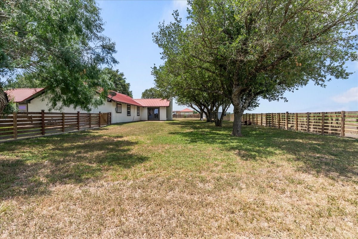 9795 County Road 2249 Sinton, TX 78387 - Photo 29 of 37 a house view with a garden space