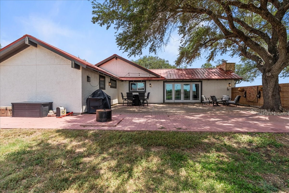 9795 County Road 2249 Sinton, TX 78387 - Photo 3 of 37 a view of a house with a yard and tree s