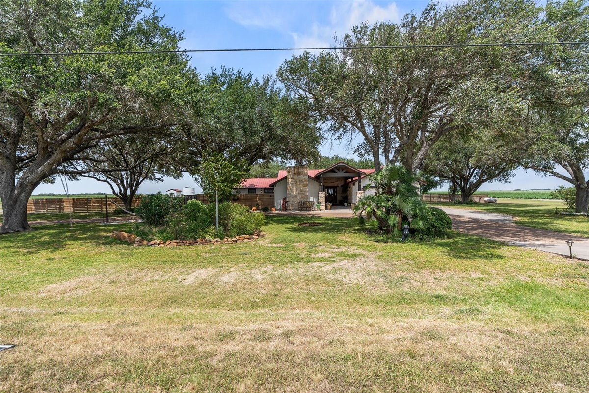 9795 County Road 2249 Sinton, TX 78387 - Photo 34 of 37 a small pool with trees in the background