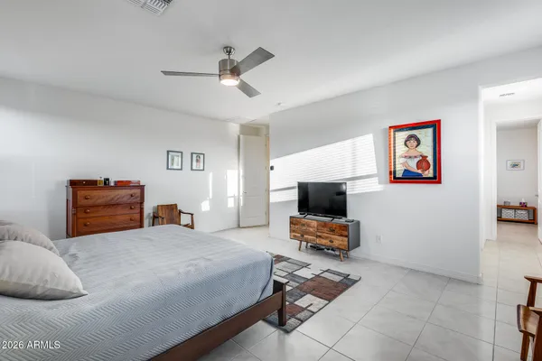 a bedroom with a bed and furniture