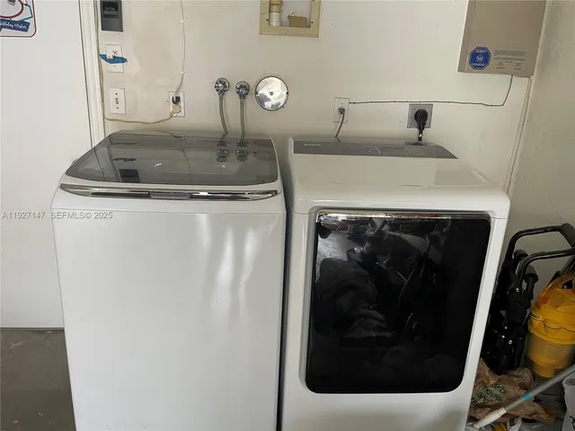 a view of a car parked front of a house