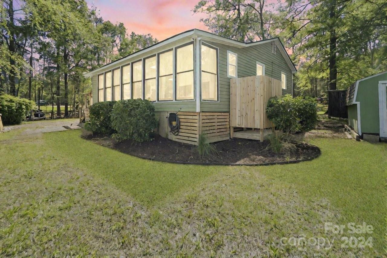 1405 Deer Run Road Ridgeway, SC 29130 - Photo 1 of 48 a view of a house with a yard