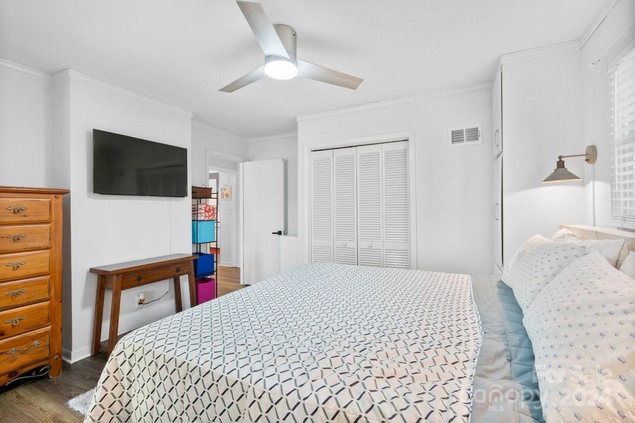 1405 Deer Run Road Ridgeway, SC 29130 - Photo 21 of 48 a bedroom with a bed and a flat screen tv
