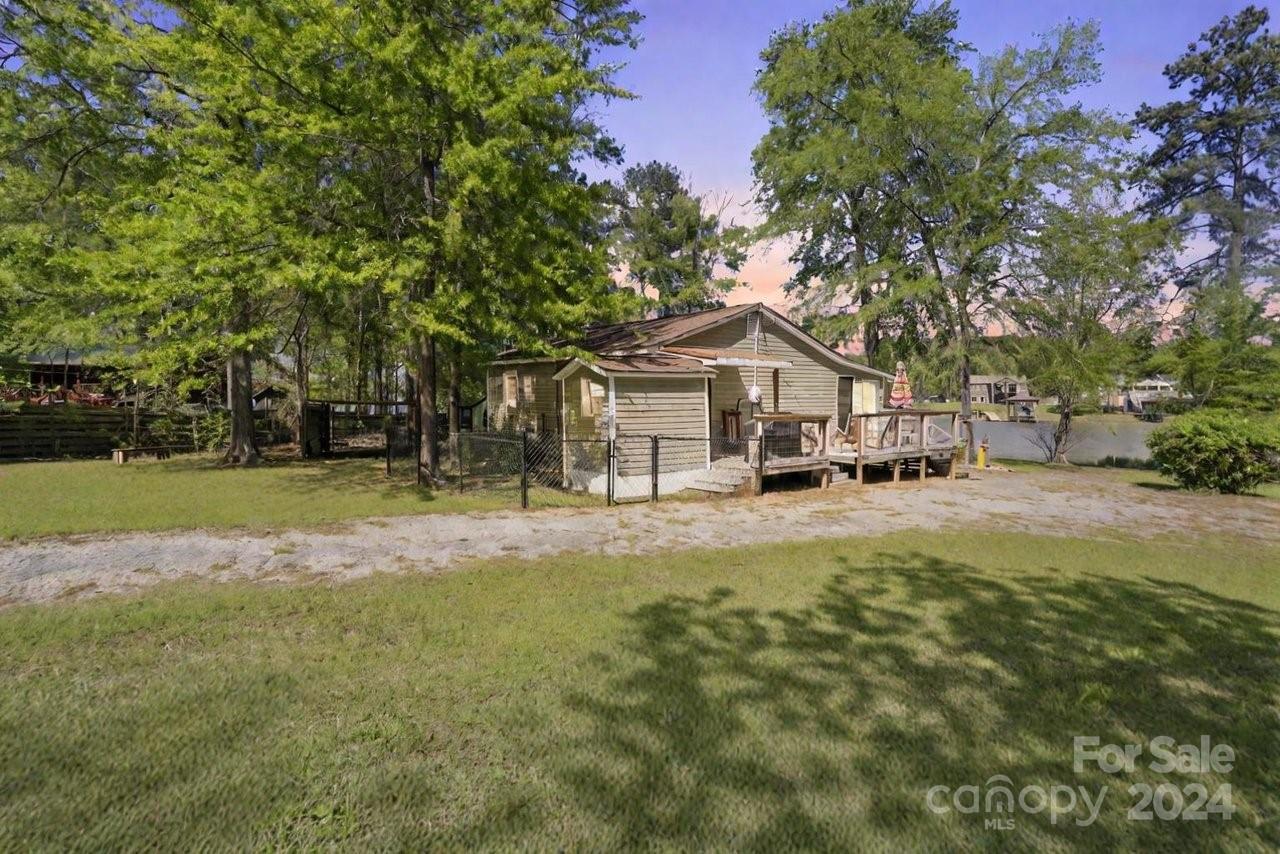 1405 Deer Run Road Ridgeway, SC 29130 - Photo 24 of 48 a house view with a garden space
