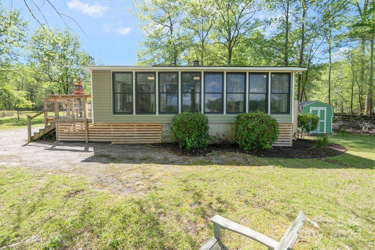 1405 Deer Run Road Ridgeway, SC 29130 - Photo 25 of 48 a front view of a house having yard