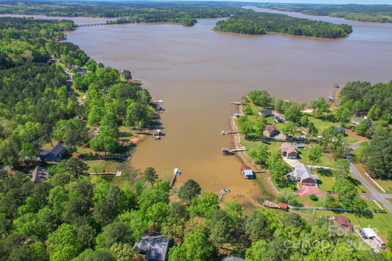 1405 Deer Run Road Ridgeway, SC 29130 - Photo 35 of 48 an aerial view of a house with a yard and a lake view