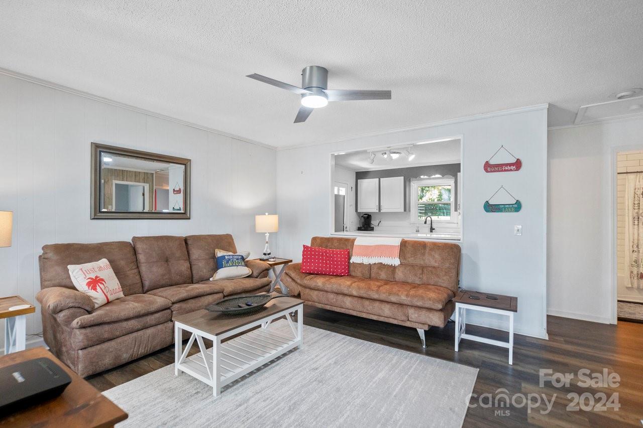 1405 Deer Run Road Ridgeway, SC 29130 - Photo 8 of 48 a living room with furniture and wooden floor