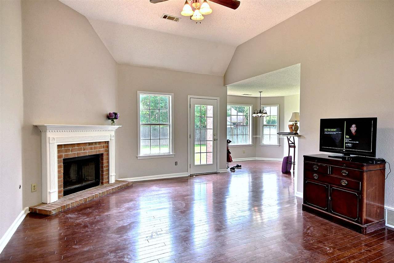 1358 River Ridge Drive Collierville, TN 38017 - Photo 3 of 18 Great Room with Fireplace open to Kitchen