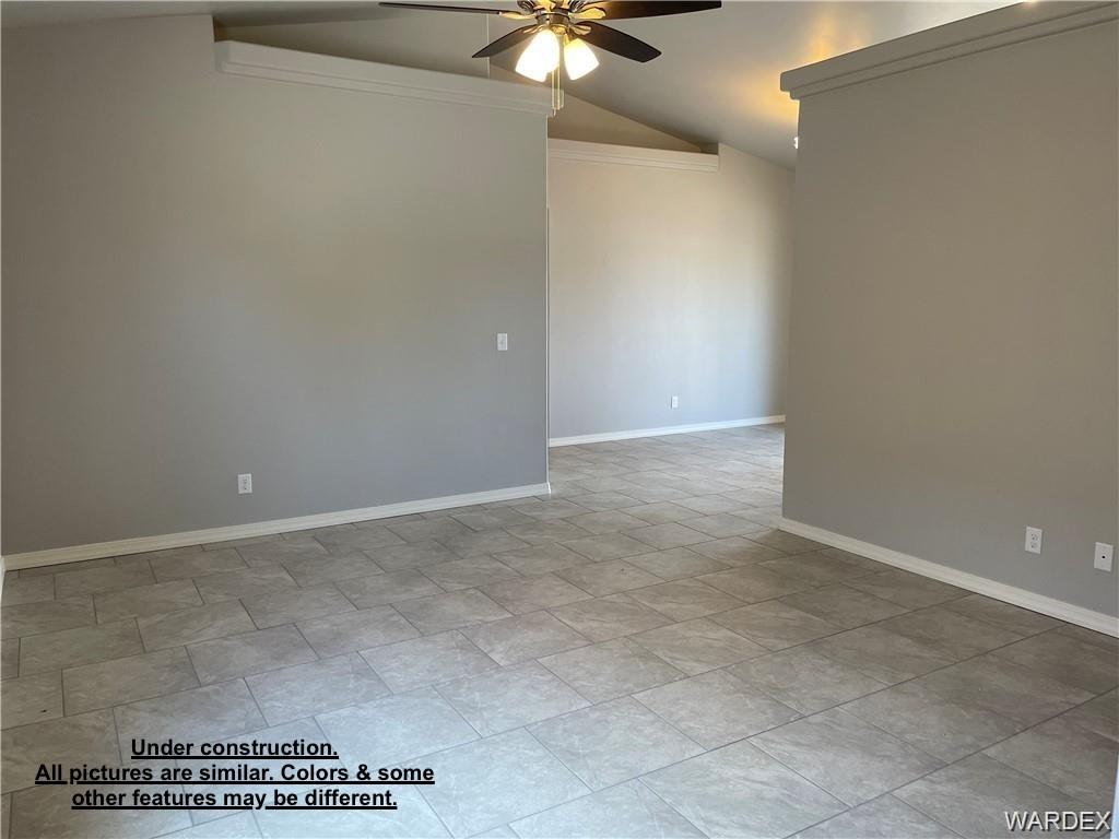 3595 North Verdugo Road Kingman, AZ 86409 - Photo 3 of 21 Spacious interior featuring light gray wall paint and light-toned tile flooring