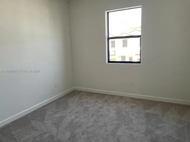 a view of a room with an empty space