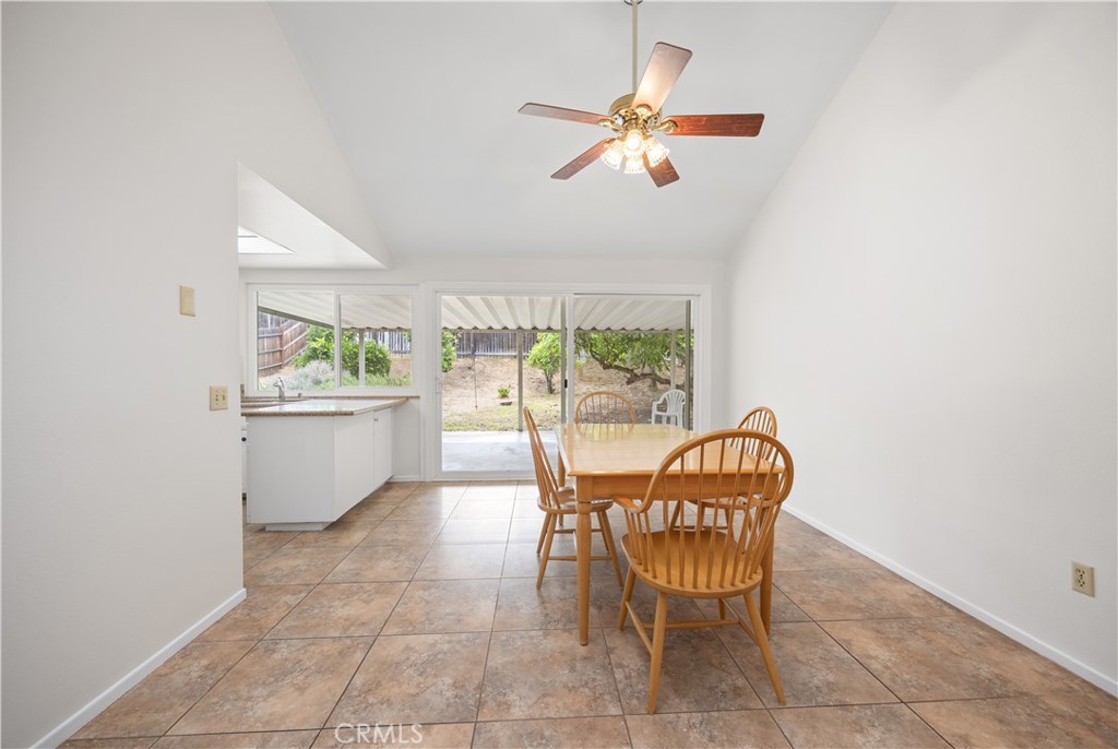 3430 Bahia Place Riverside, CA 92507 - Photo 11 of 34 a dining room with furniture and chandelier