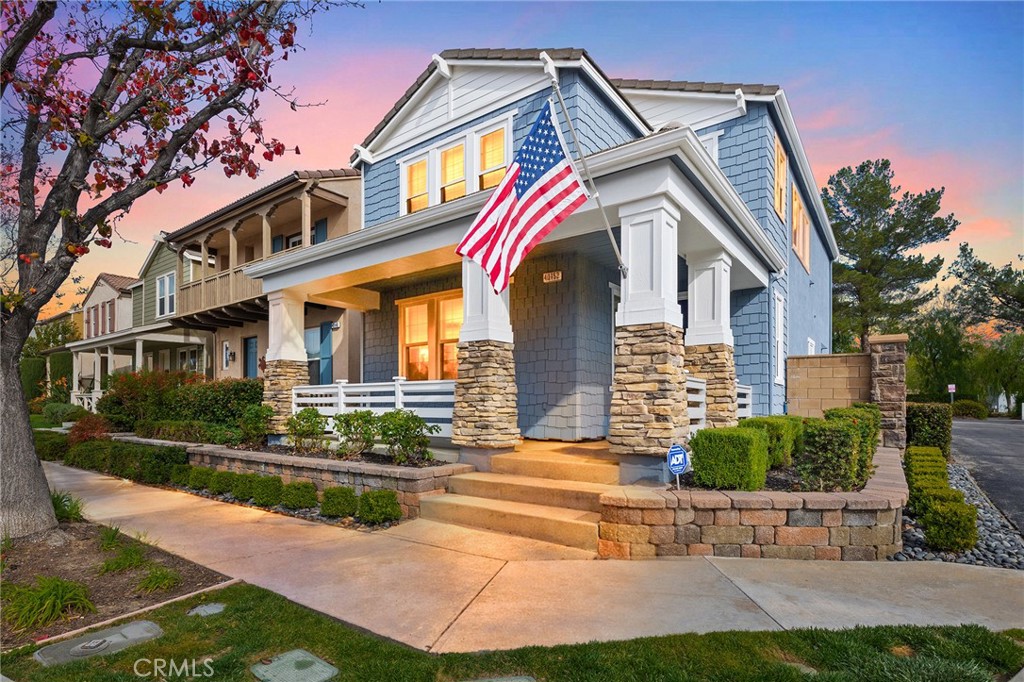 40152 Stowe Road Temecula, CA 92591 - Photo 1 of 1 a front view of a house with garden