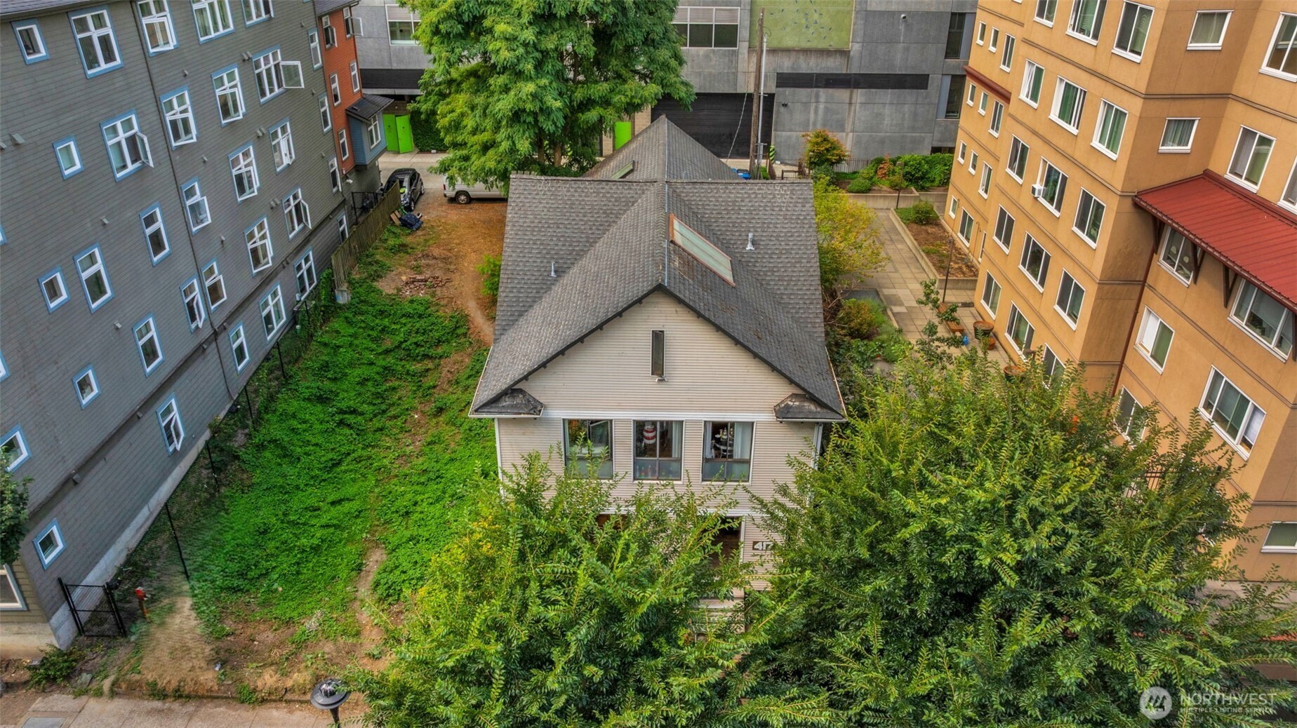 417 Minor Avenue North Seattle, WA 98109 - Photo 2 of 36 a house view with a garden space