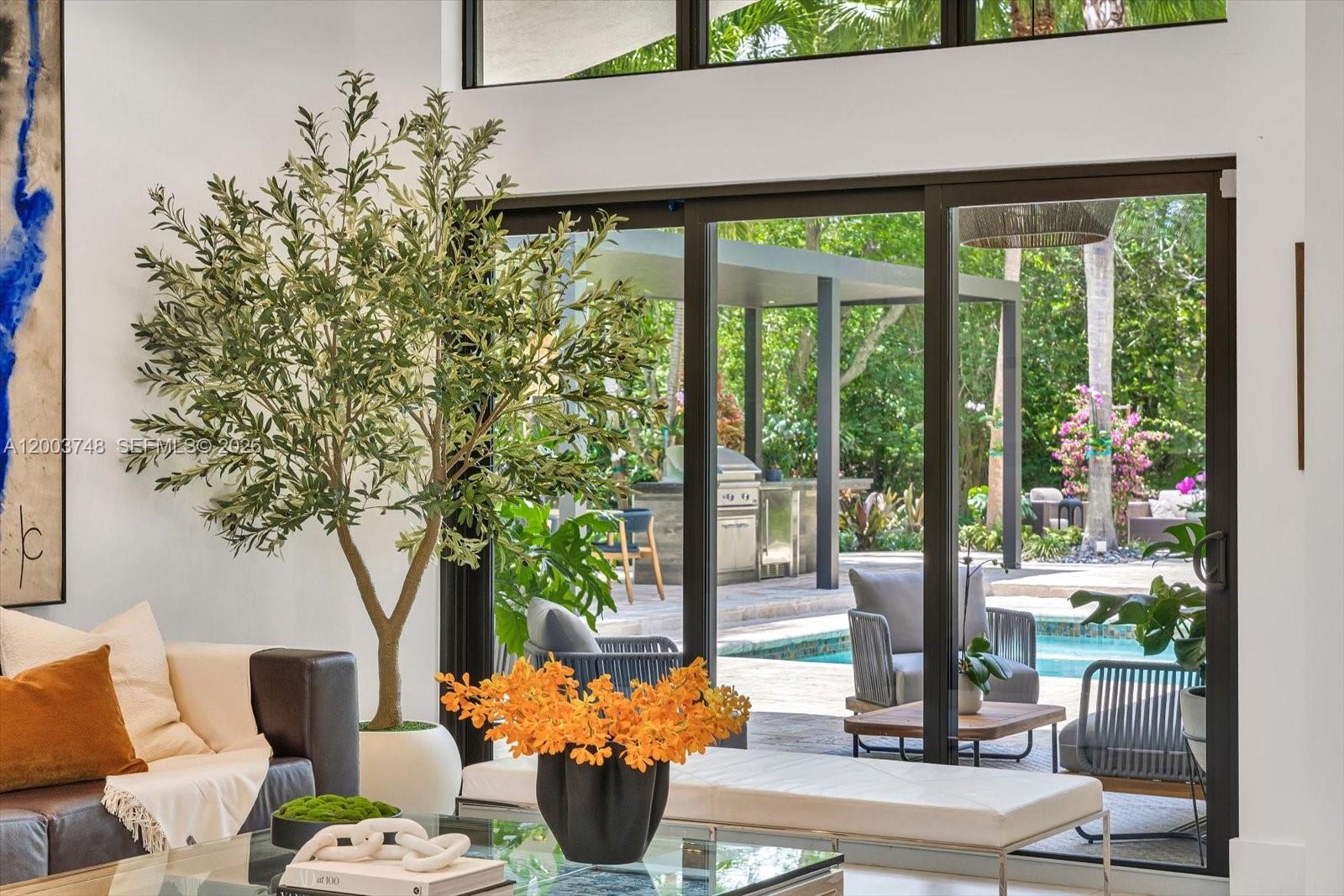 2675 Hackney Road Weston, FL 33331 - Photo 23 of 61 a outdoor living space with furniture and garden view