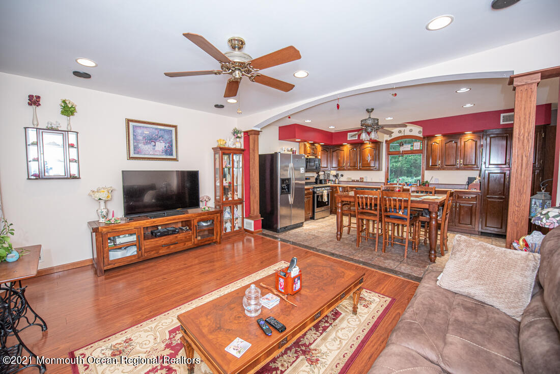 490 Hyson Road Jackson, NJ 08527 - Photo 25 of 47 Living room towards kitchen