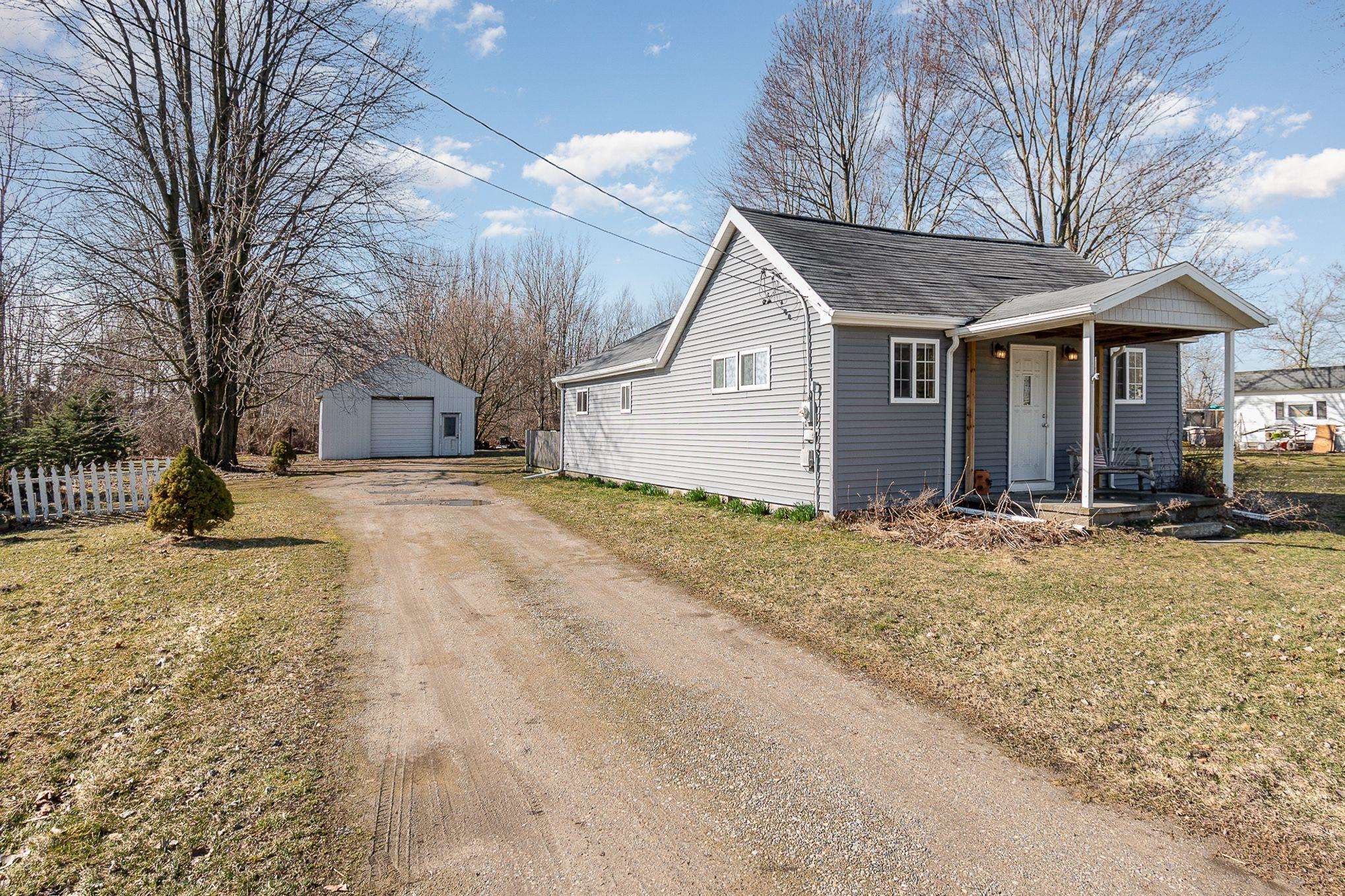 8636 East Monroe Road Wheeler, MI 48662 - Photo 1 of 14