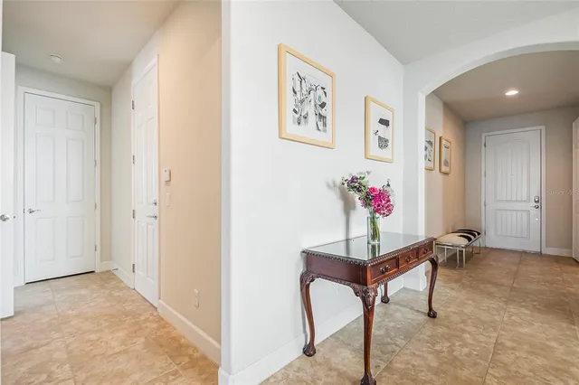 a kitchen with stainless steel appliances granite countertop a sink and a stove