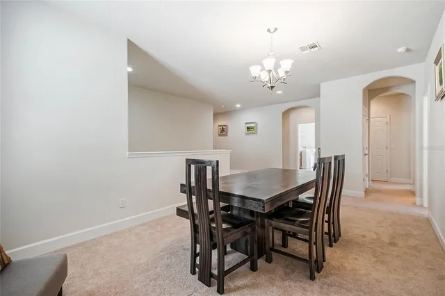 a utility room with a sink washer and dryer