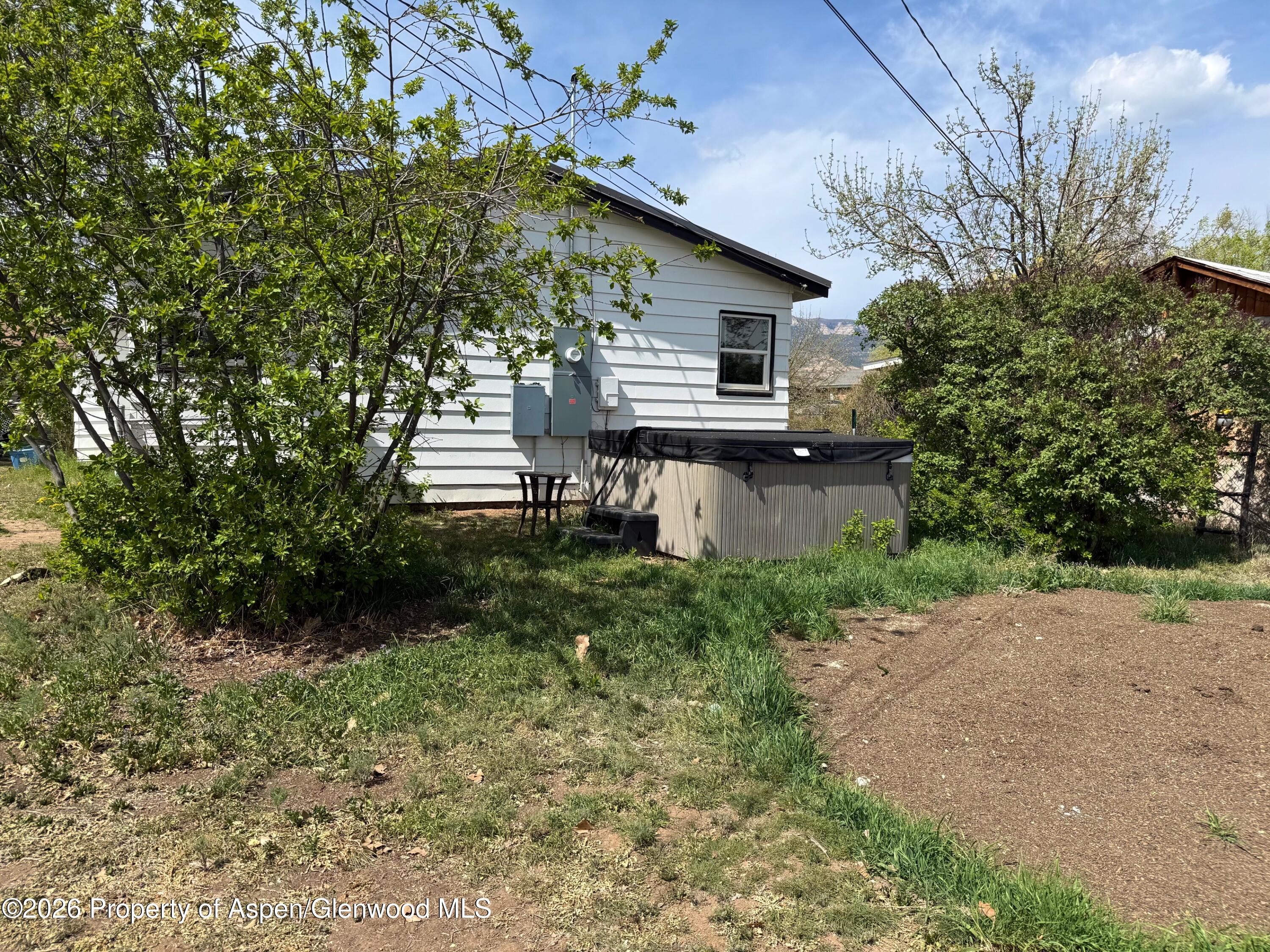 326 Prefontaine Avenue Rifle, CO 81650 - Photo 12 of 12 a front view of a house with garden