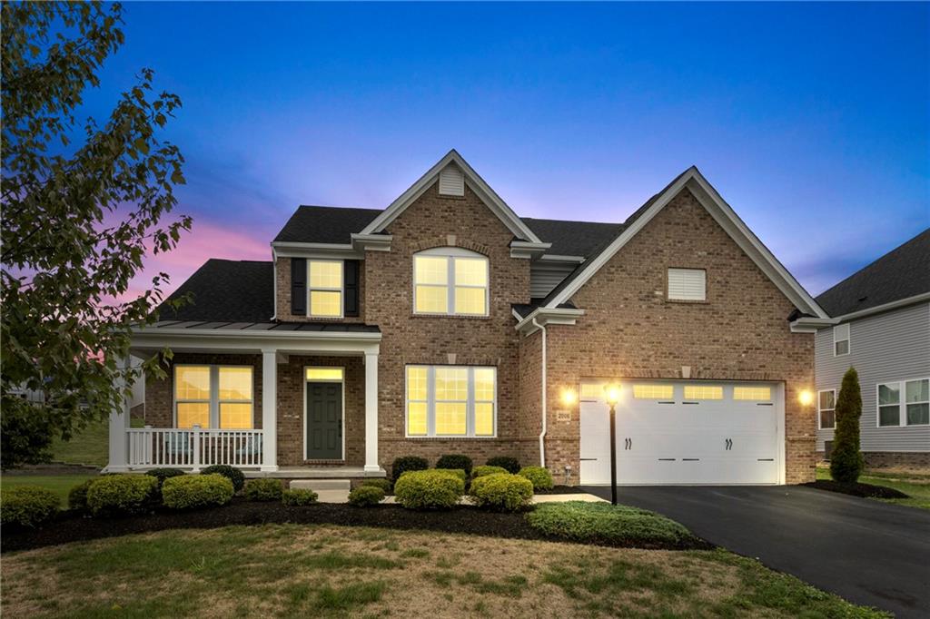 2006 Dantry Dr. Canonsburg, PA 15317 - Photo 2 of 32 a front view of a house with a yard