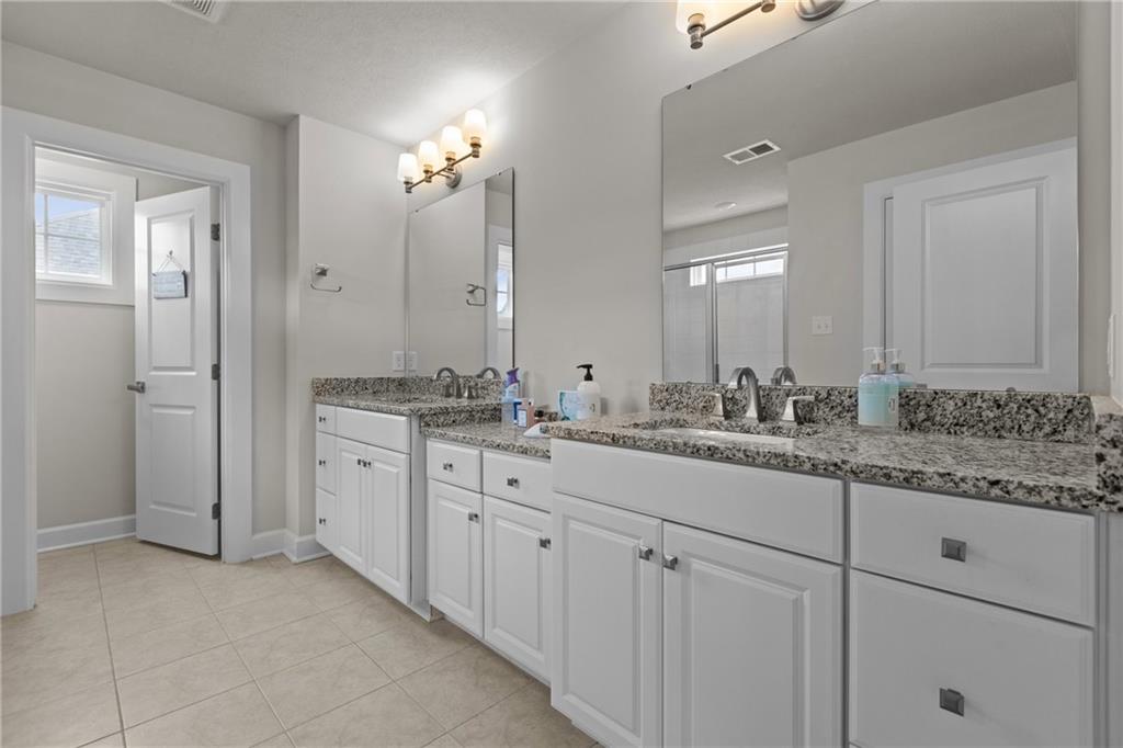 2006 Dantry Dr. Canonsburg, PA 15317 - Photo 21 of 32 a bathroom with double sink and a mirror