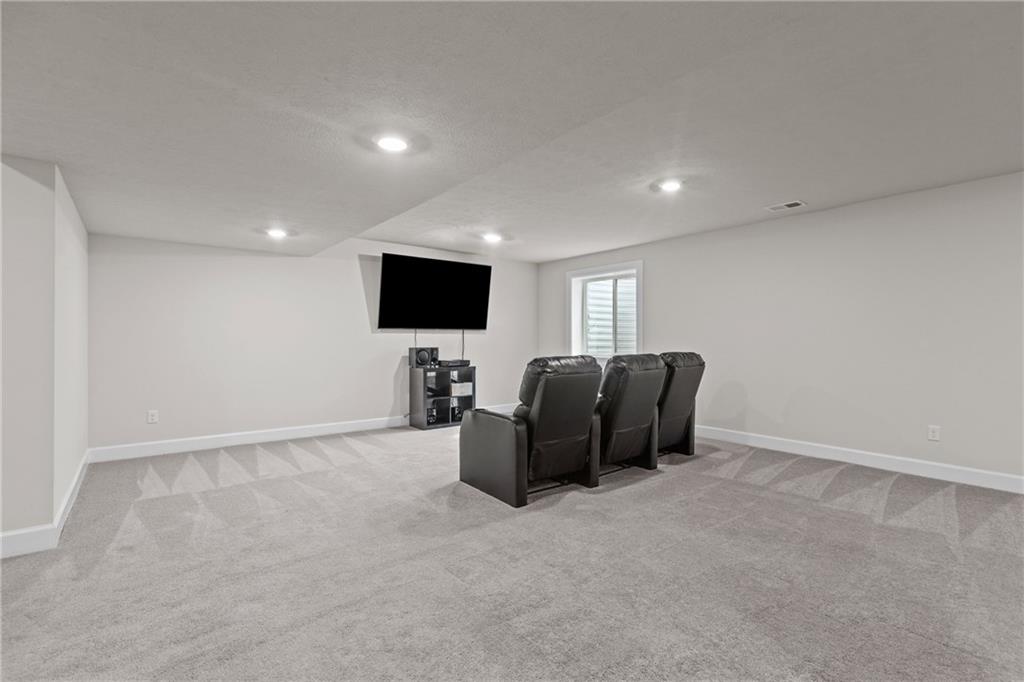 2006 Dantry Dr. Canonsburg, PA 15317 - Photo 29 of 32 a living room with furniture and a flat screen tv