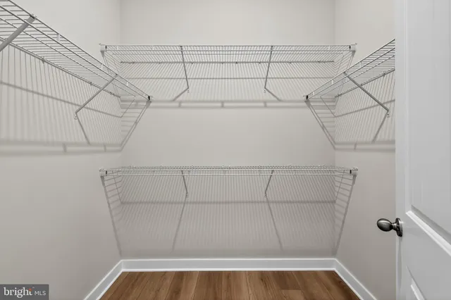 a view of a room with racks on the wall