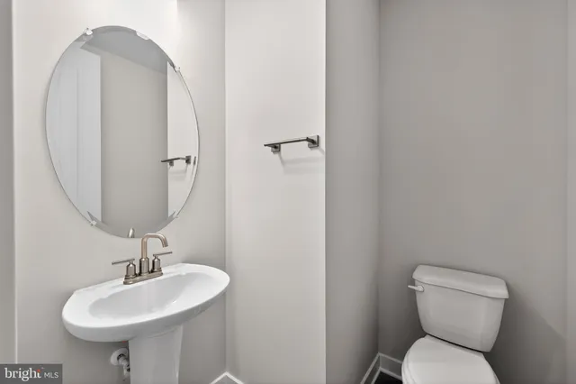 a view of a kitchen counter space and cabinets