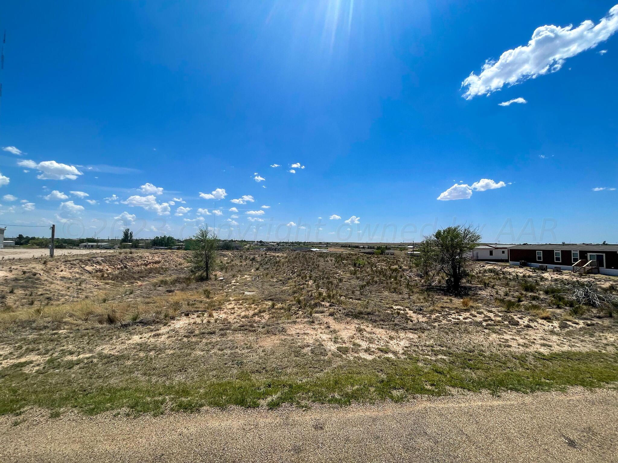 1409 Heidi Lane Amarillo, TX 79108 - Photo 2 of 2 a view of a room with floor to ceiling window