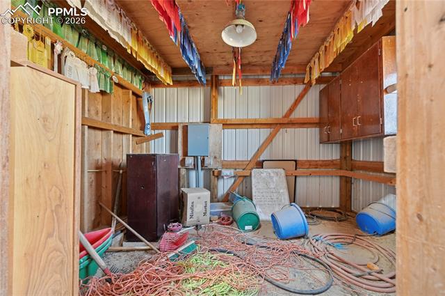 16830 Finch Road Colorado Springs, CO 80928 - Photo 42 of 49 Tack room inside of 48' x 30' barn