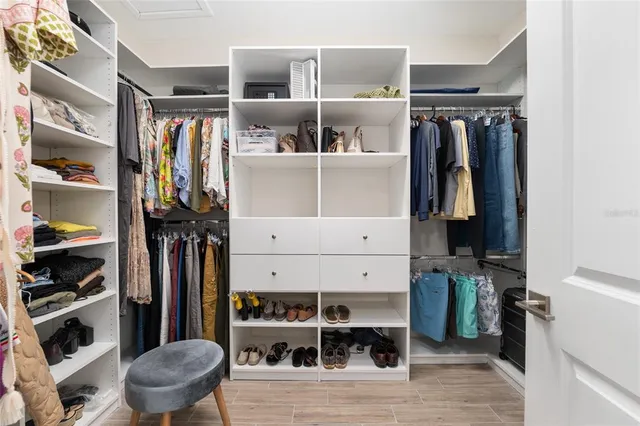 an aerial view of a house with garden space and lake view