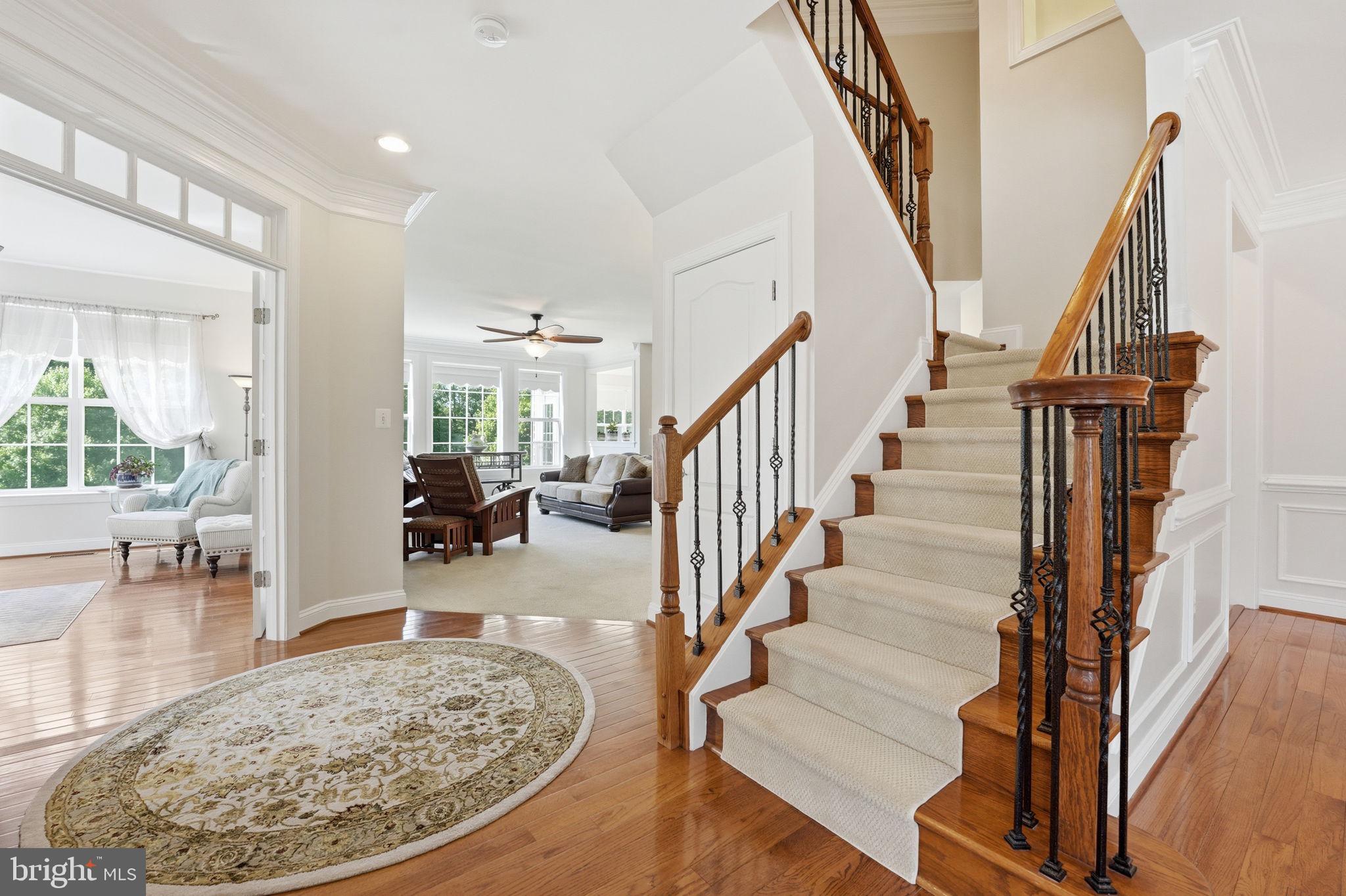 13060 Queen Chapel Road Woodbridge, VA 22193 - Photo 27 of 77 Hardwood & Metal Spindle stair case