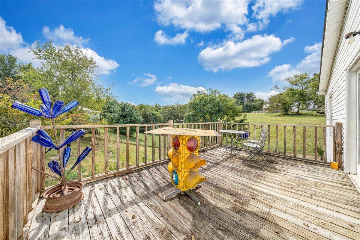 2410 Overlook Road Northeast Roanoke, VA 24012 - Photo 15 of 19 a view of a roof deck with wooden floor and fence