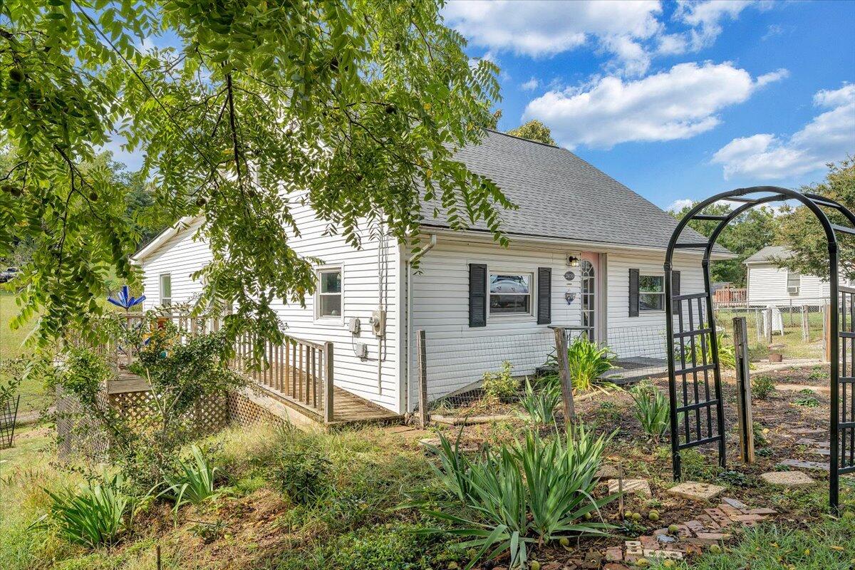 2410 Overlook Road Northeast Roanoke, VA 24012 - Photo 3 of 19 a front view of a house with garden