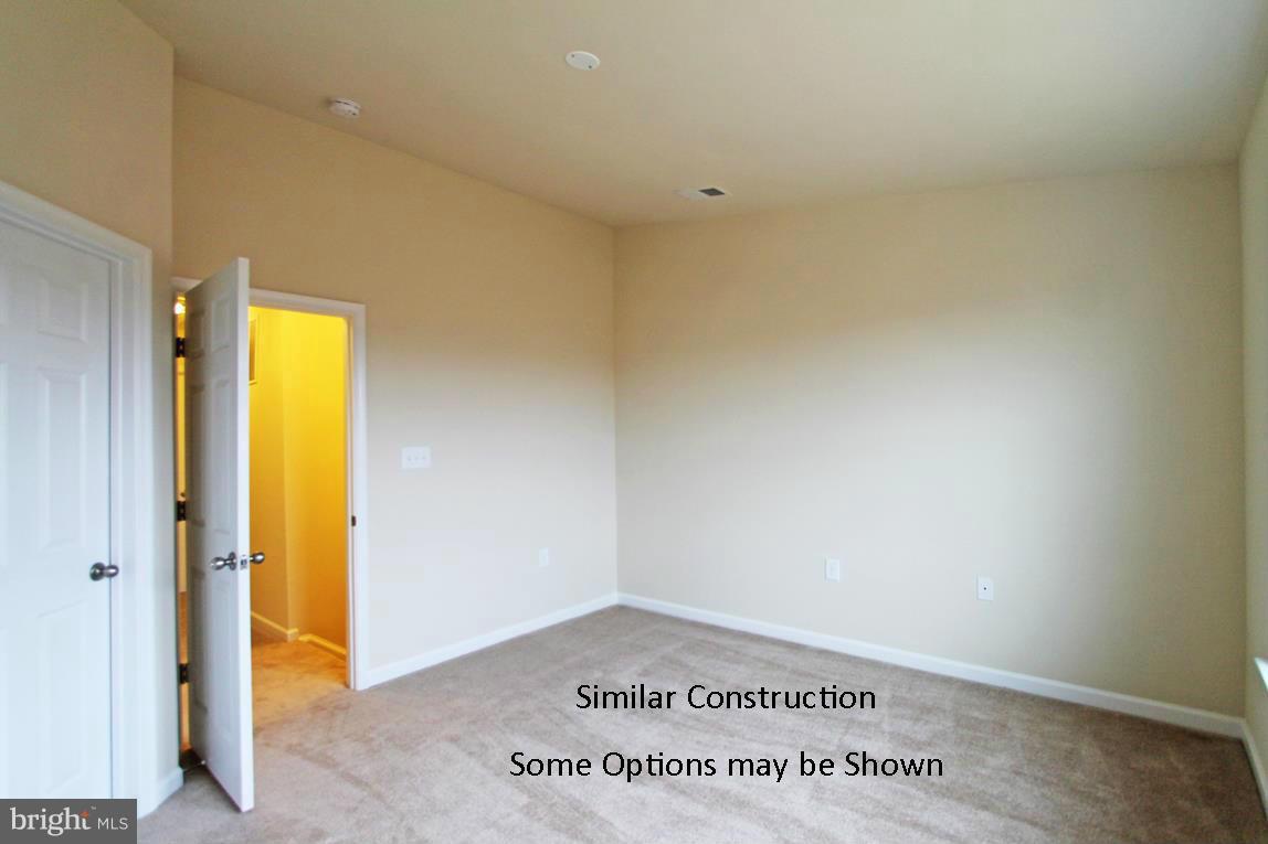 0 Stallion Street, Unit 408 Ranson, WV 25438 - Photo 13 of 30 a view of an empty room