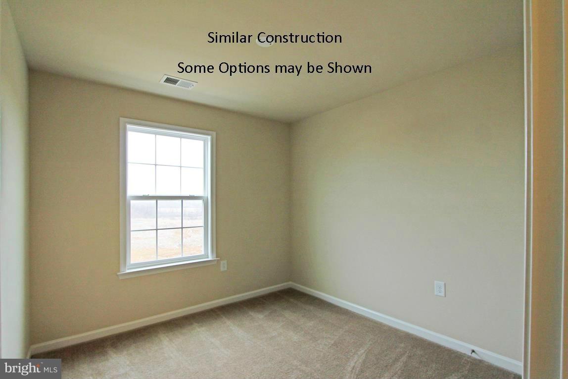 0 Stallion Street, Unit 408 Ranson, WV 25438 - Photo 19 of 30 an entryway with window