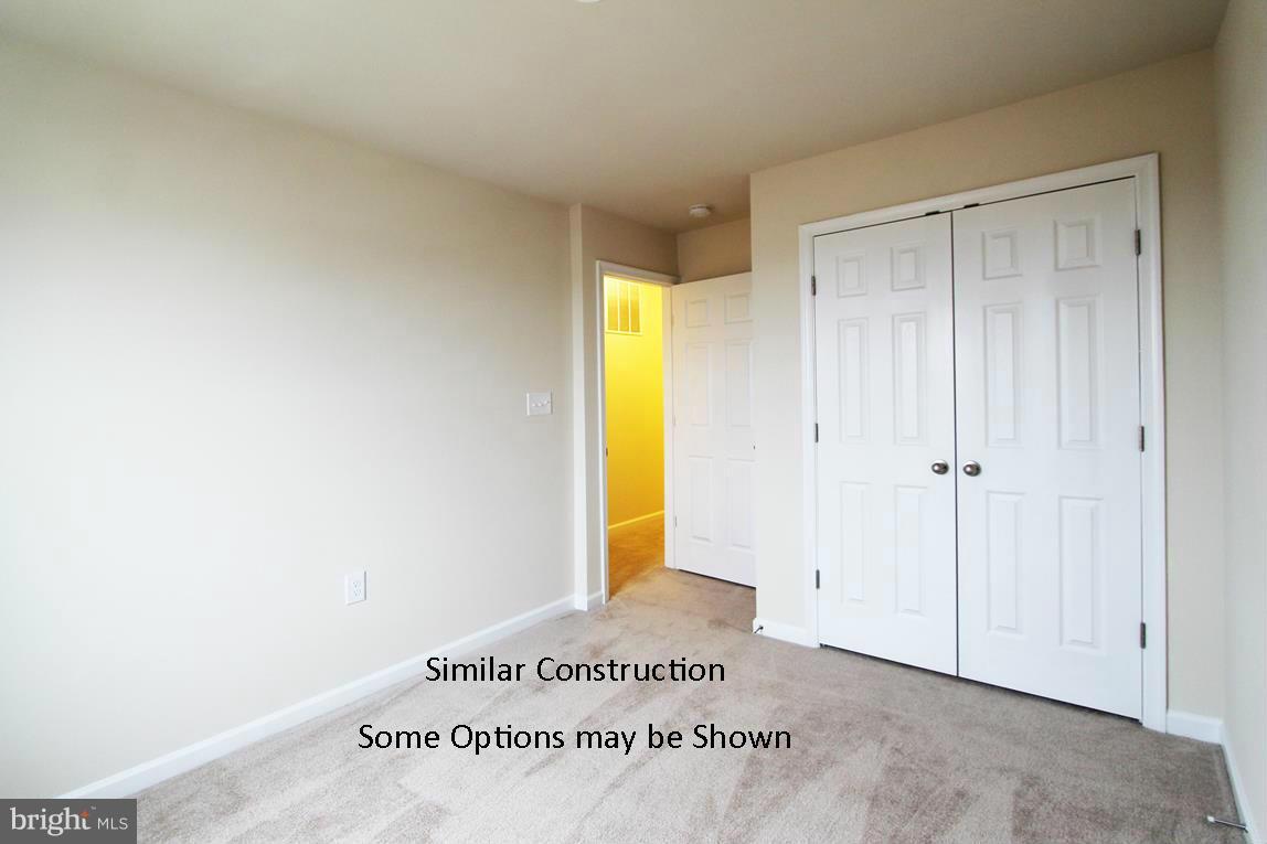 0 Stallion Street, Unit 408 Ranson, WV 25438 - Photo 21 of 30 a view of a bedroom