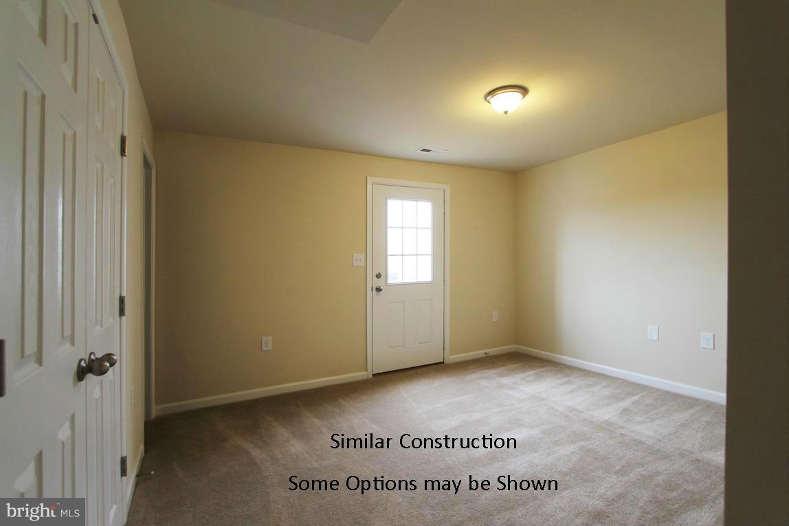 0 Stallion Street, Unit 408 Ranson, WV 25438 - Photo 23 of 30 a view of an empty room