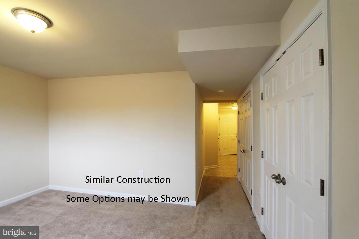 0 Stallion Street, Unit 408 Ranson, WV 25438 - Photo 24 of 30 a view of a hallway