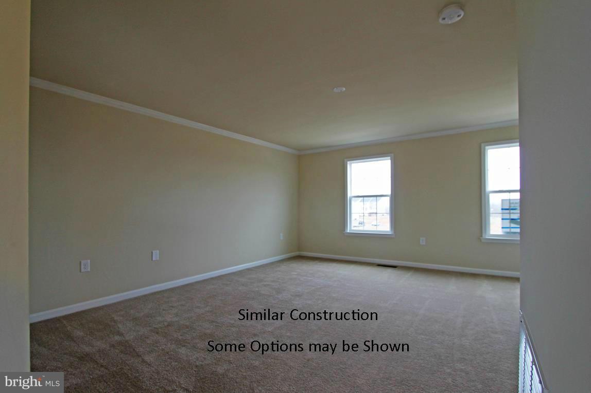 0 Stallion Street, Unit 408 Ranson, WV 25438 - Photo 5 of 30 a view of an empty room and window