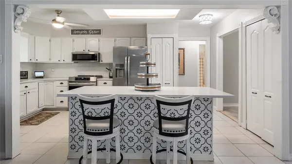 a view of kitchen and windows