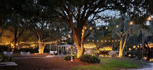 a view of a house with pool table and chairs