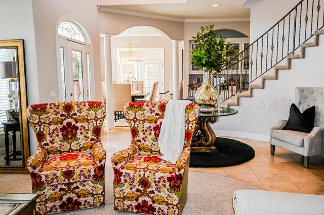 a view of a workspace with furniture and a couch
